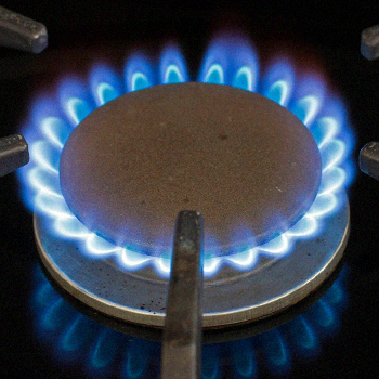A low flame on a stove