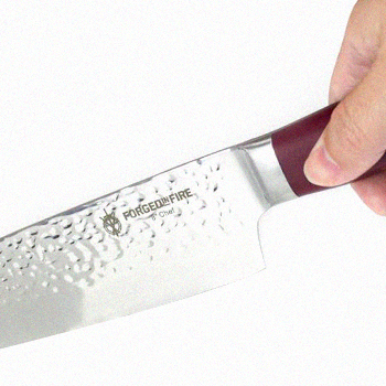 Using the Forged in Fire knife to cut