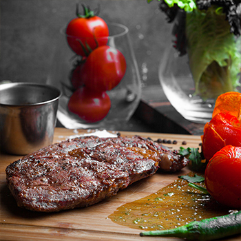 A steak on a cutting board
