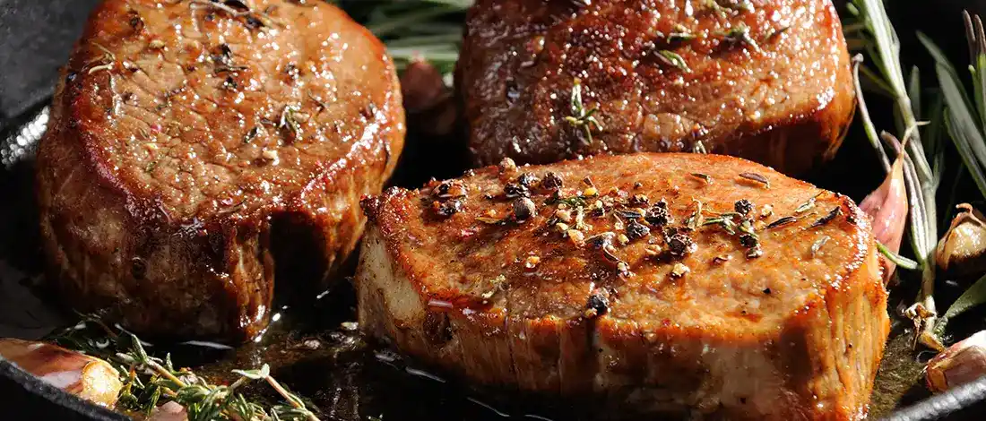 Rib eye steak slices on close up