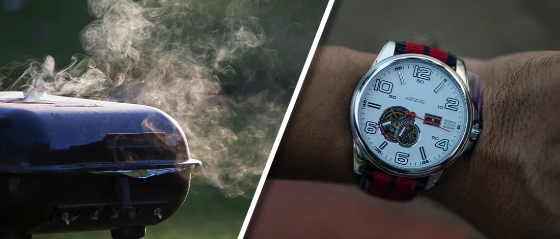 A closed lid smoker and checking time on hand watch