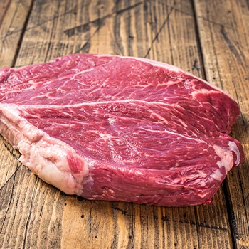 A brisket on wooden floor