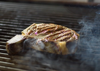 A meat laying on a grill
