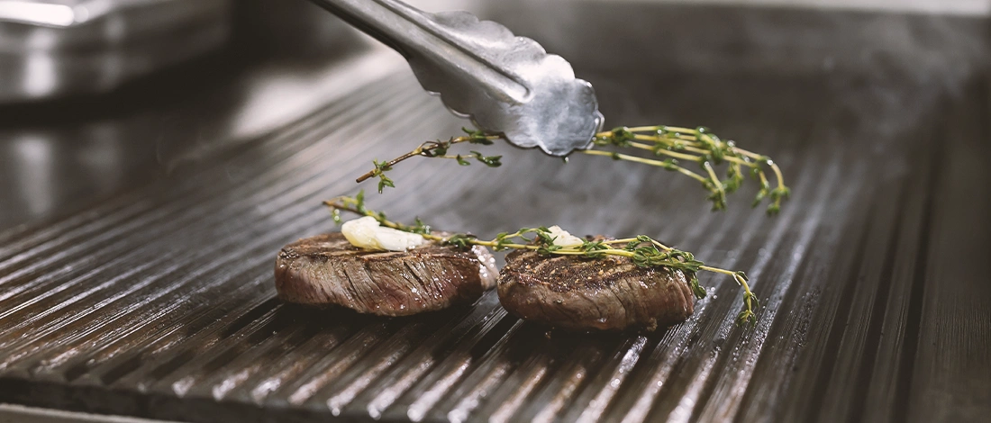 Meat being seared