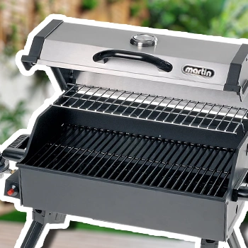 Martin Porgtable bbq propane gas grill brand in the backyard
