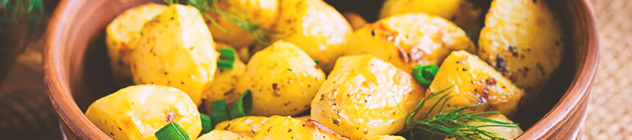 Small cooked potatoes in a bowl
