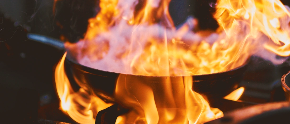 A steak being cooked on high flame