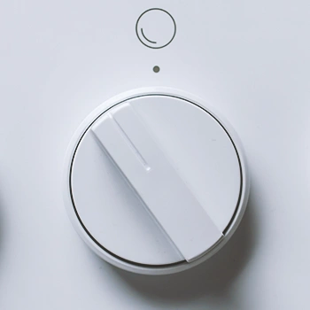 A close up shot of a temperature knob