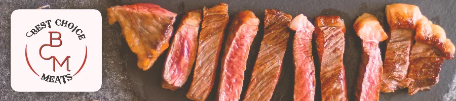 Cooked steak on a black table with the Best Choice Meat logo