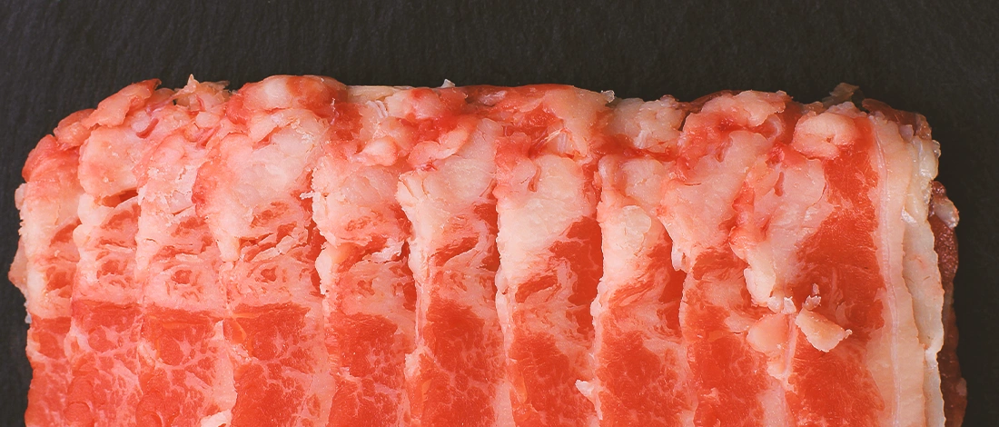 A row of frozen steak