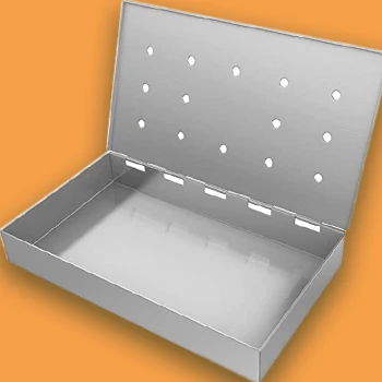 An open stainless smoker box