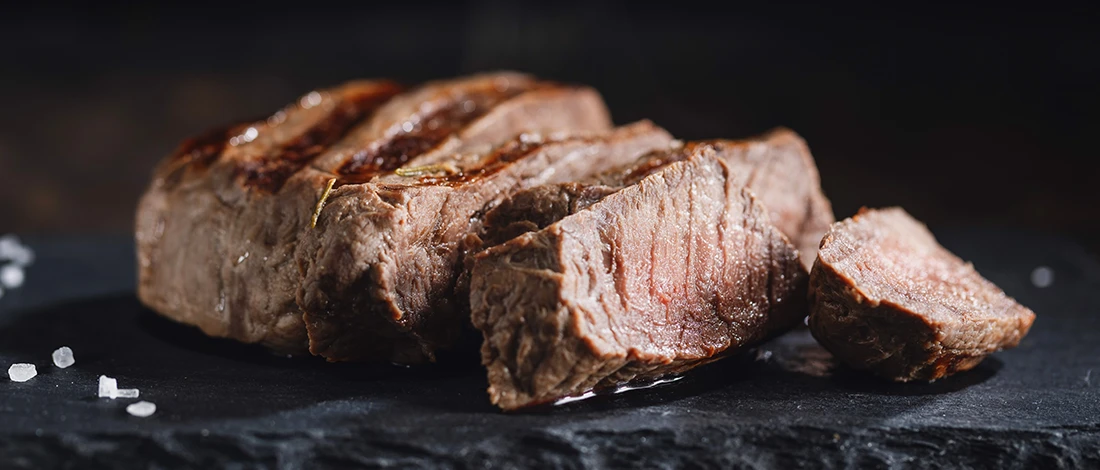 Close up image of sliced steak