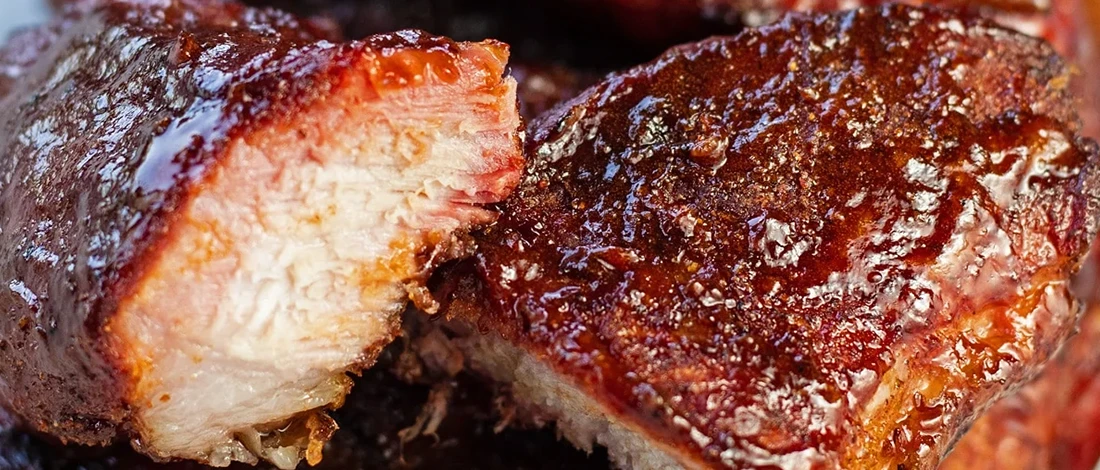 A close up shot of smoked country-style pork ribs