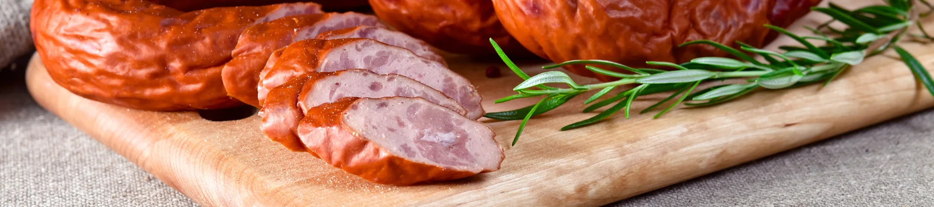 Sliced smoked sausage with sides