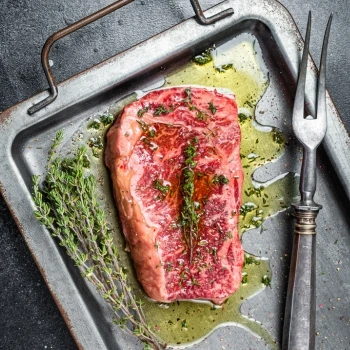 A top view of marinated steak