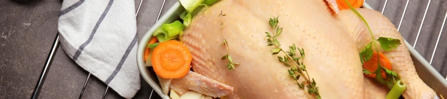 A raw turkey on a tray