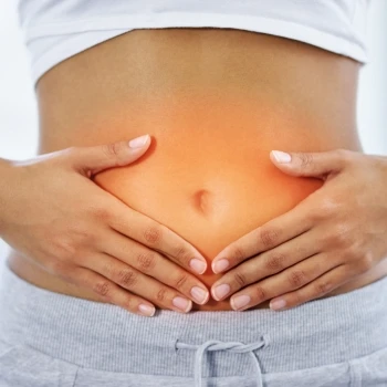 A woman with improved gut health