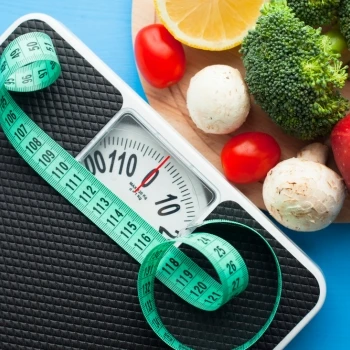 A weighing scale and a measuring tape