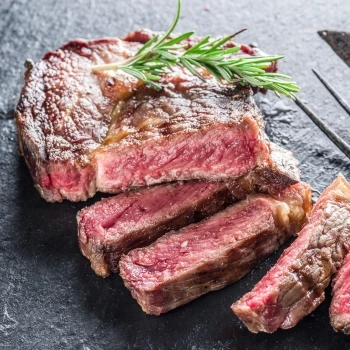 A delicious medium rare steak.
