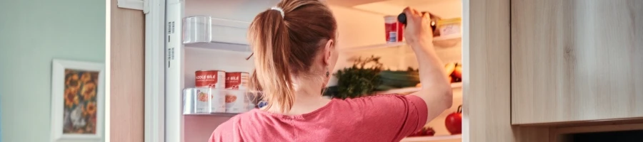 A woman storing the leftovers