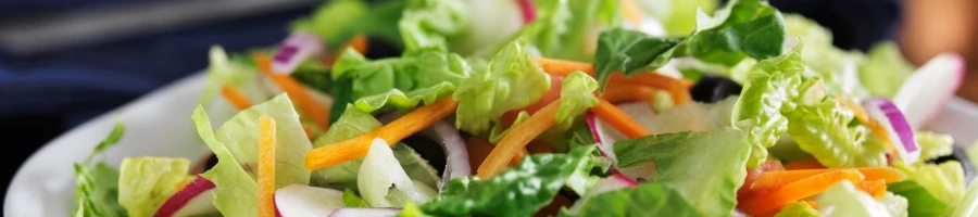 A healthy salad as side dish for steak