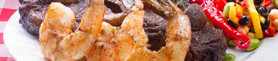 Shrimp and steak on a plate