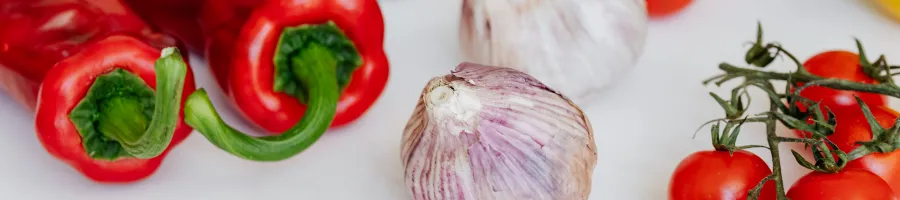 Peppers and Onions prepared to be chopped to cook Chicago Steak Sandwich