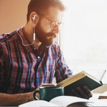 man reading book