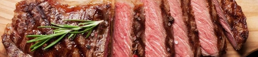 close up image cooked meat slices in a plate