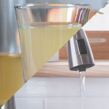 Vinegar in glass and Water through sink