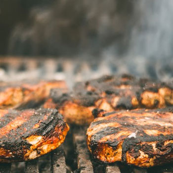 Meat on a smoking grill