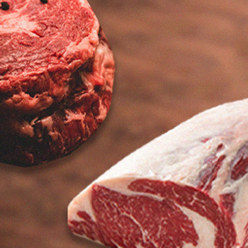 A closeup photo of a prime rib and ribeye steak