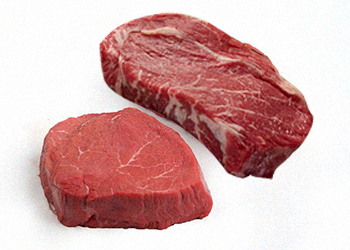 Ribeye and Sirloin steak on a blank white background