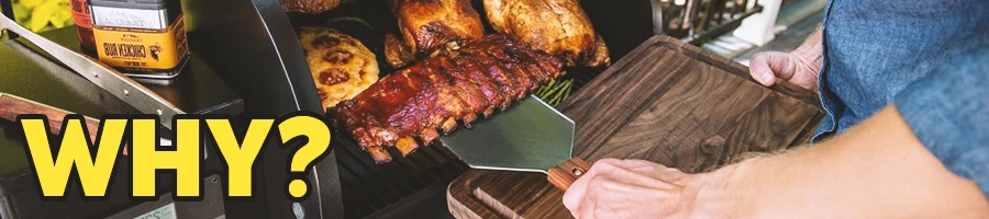 A person using a Traeger grill