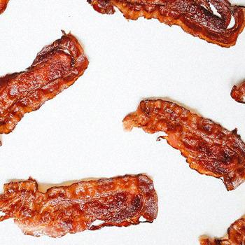 Bacon strips on a white background
