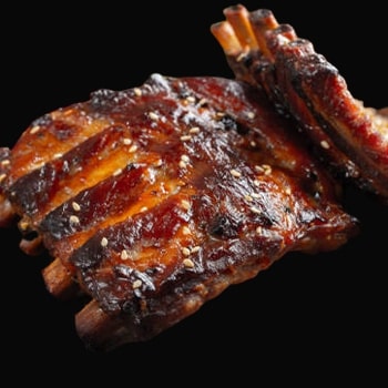 Pork ribs with black background