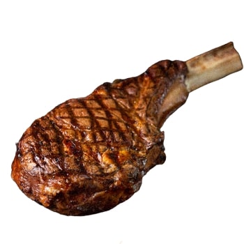 A cooked tomahawk steak on white background