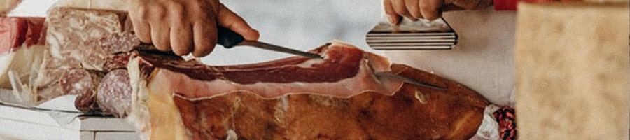 A man preparing his smoked meat to last longer