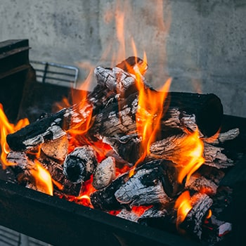 A burning charcoal in a grill