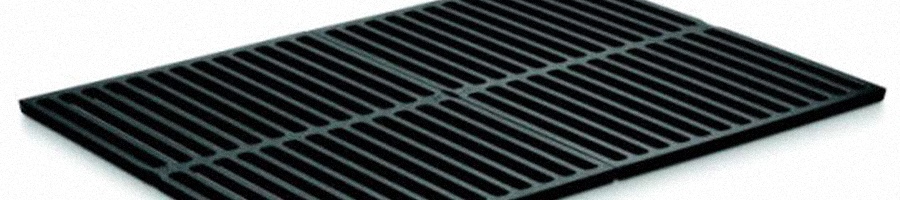 A rectangular shaped iron grill grate