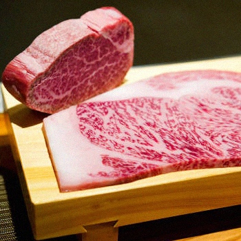 Fresh meats on top of a wooden surface