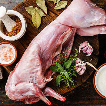 Rabbit meat being prepared for cooking