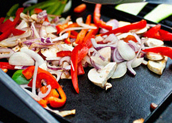 Cooking vegetables on a griddle