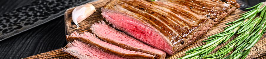 Flank steak on a cutting board