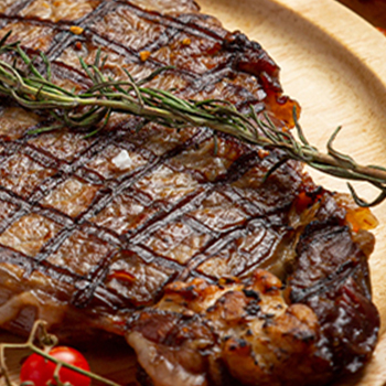 A close up image of a grilled steak