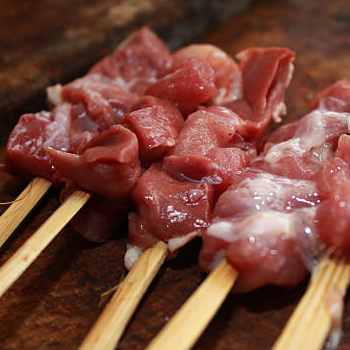 A goat meat on a stick