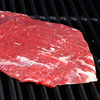 Flank steak on a grill