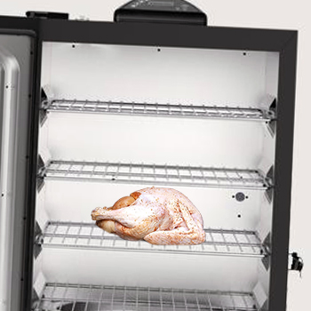 A turkey inside a smoker