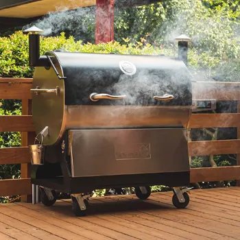 Smoking Rectec griller outdoors