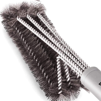 Close up image of a grill brush